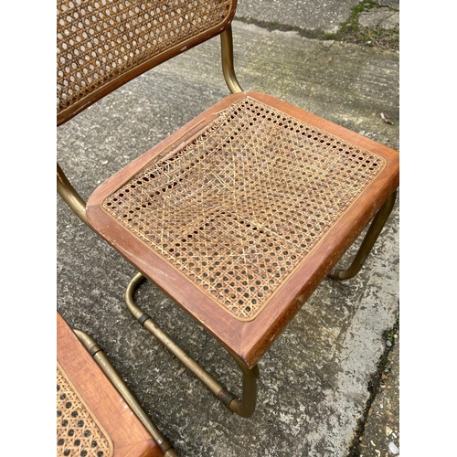 98 - A set of four mid century chairs with begere seats