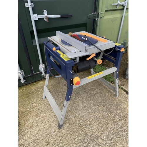 439 - MacAllister Flip over Saw COD 2000FLS on folding stand