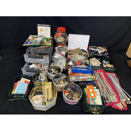 517 - Large quantity of sewing accessories, buttons, buckles, knitting needles etc