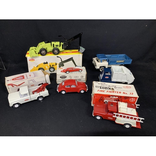 756 - Four boxed Tonka Vehicles and unboxed Tonka refuse cart & Hi-way truck