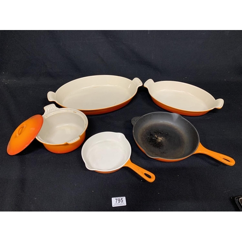 795 - Two Le Creuset dishes and casserole plus two cast iron frying pans