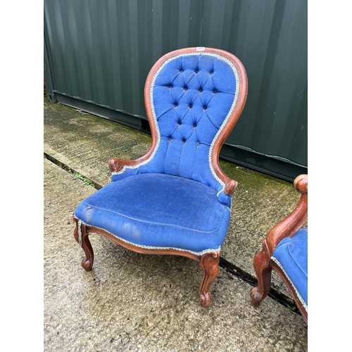 280K - A ladies and gents pair of blue upholstered spoon back salon chairs