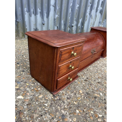 310A - A mahogany desk top stationery rack 91x 21x27