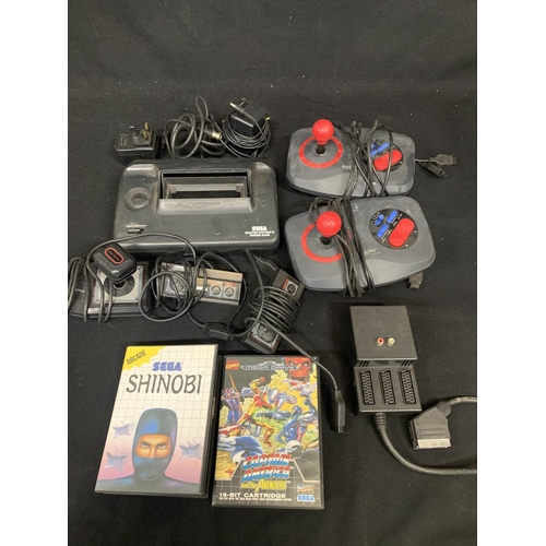 668 - Sega consoles and Quickshot consoles plus two games