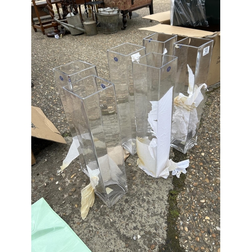 120 - Six tall square form glass vases 50 cm