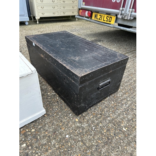 127 - A large black painted locking zinc lined trunk with key together with a white painted box  92x 50x40