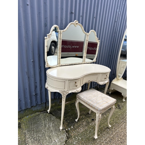 130 - A French's style white and gold painted dressing table with stool