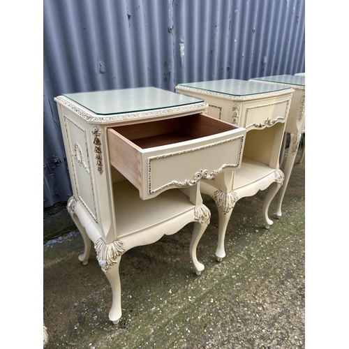 132 - A pair of french style white and gold painted single drawer bedsides