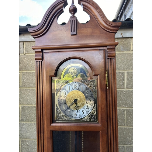 134 - A modern longcase clock by BULOVA with weights and pendulum