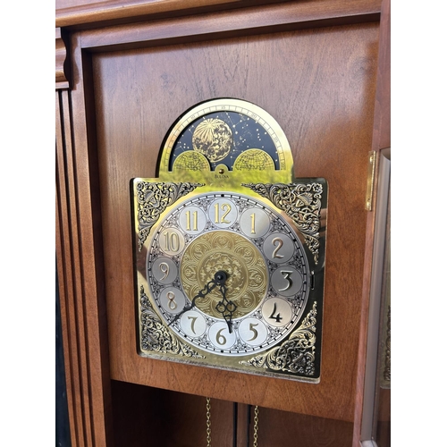 134 - A modern longcase clock by BULOVA with weights and pendulum