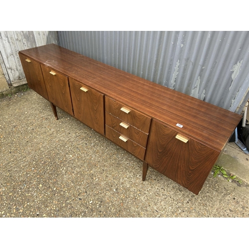 140 - A mid century teak cocktail sideboard by Wrighton 230x 45 x 75