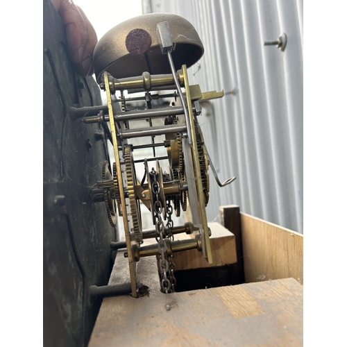 145 - A carved oak longcase clock made by Adam Costen - kirkwood with one weight and pendulum