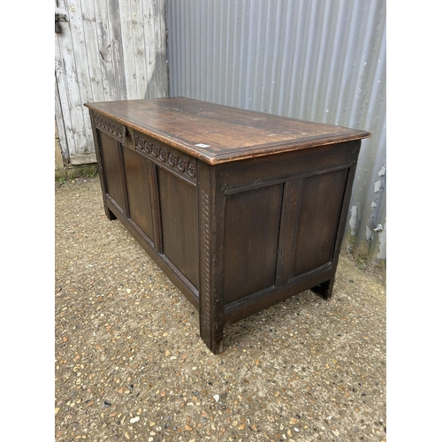 147 - A large carved oak three panel blanket box coffer 136x58x66