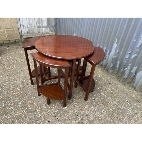 150 - An Edwardian mahogany circular nest of five tables