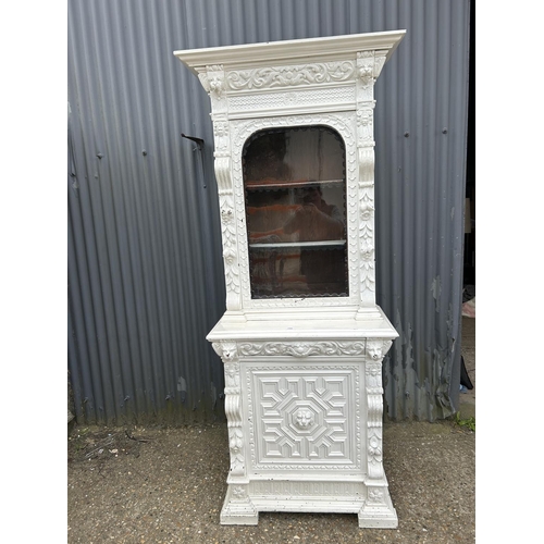 156 - A Dutch style carved oak glazed bookcase over cupboard painted white 90x50x225