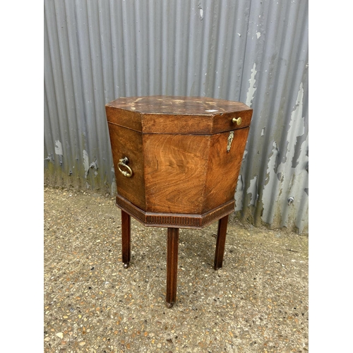 168 - A Georgian mahogany cellarette on stand