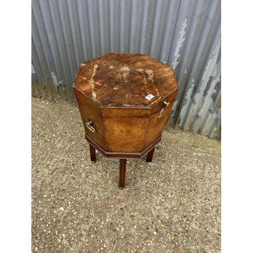 168 - A Georgian mahogany cellarette on stand