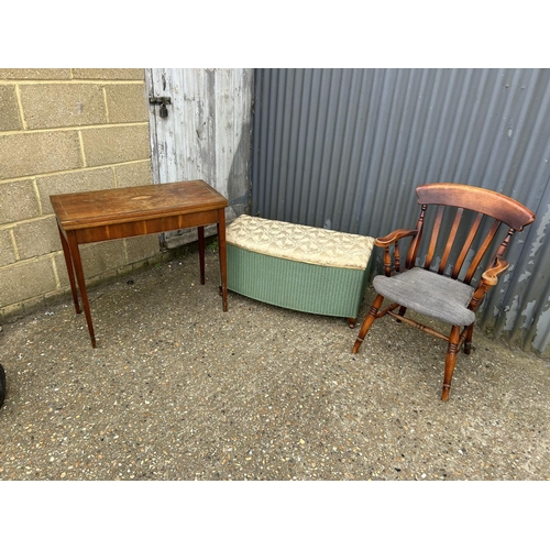 170 - A yew hall table, a green loom ottoman and a pine carver chair