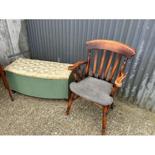 170 - A yew hall table, a green loom ottoman and a pine carver chair