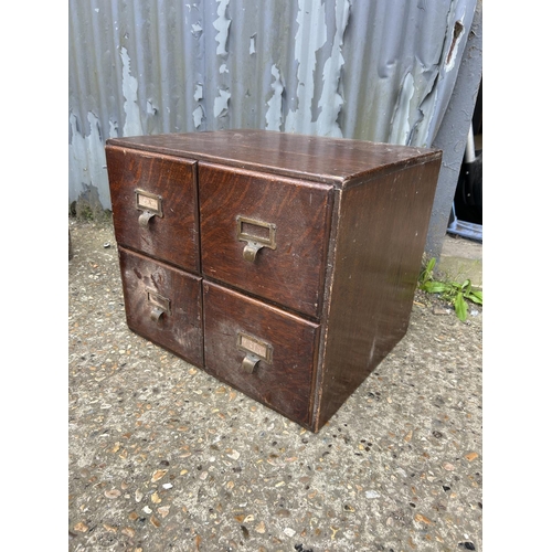 176 - A bank of four oak filing drawers 48x40x40