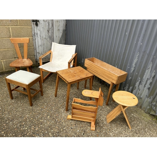 19 - A pine armchair, another chair, two side tables, folding stool and a window planter