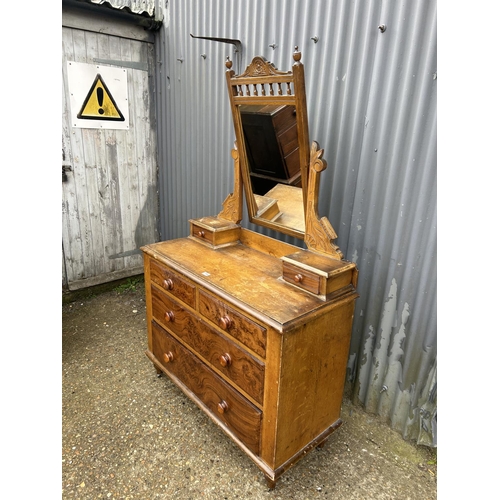 194 - A Victorian grained pine dressing chest of four drawers 110x 50x180