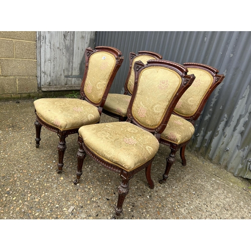 198 - A set of four Victorian mahogany dining chairs with gold pattern upholstery