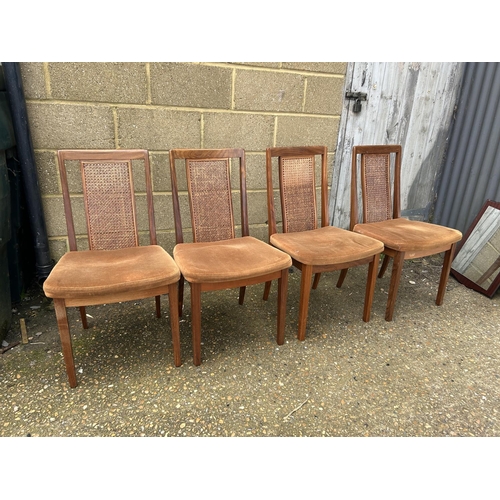 202 - A set of four g plan teak dining chairs