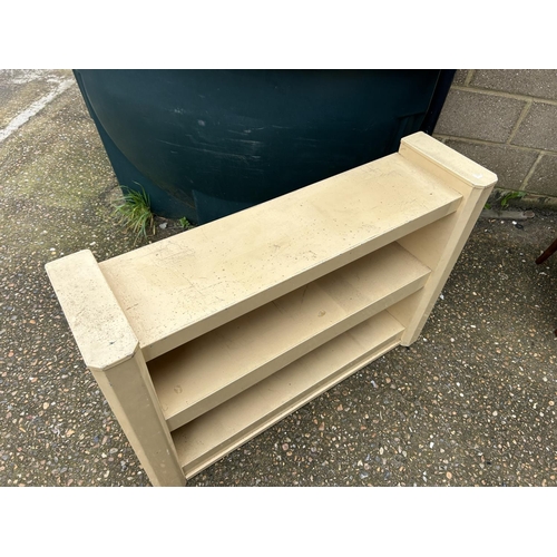 203 - A WW2 cream painted aluminium open bookshelf 108x30x77