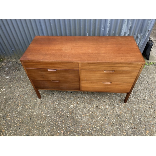 210 - A modern teak lowboy chest of six drawers 124x51x71