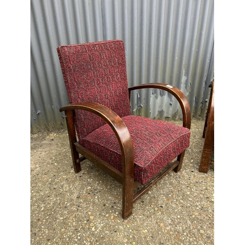 240 - A pair of deco oak decking easy chairs with red upholstered cushion seats