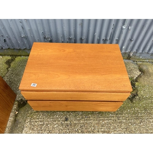 255 - A mid century teak chest of two drawers stamped 'made in Sweden'  85 x52x50