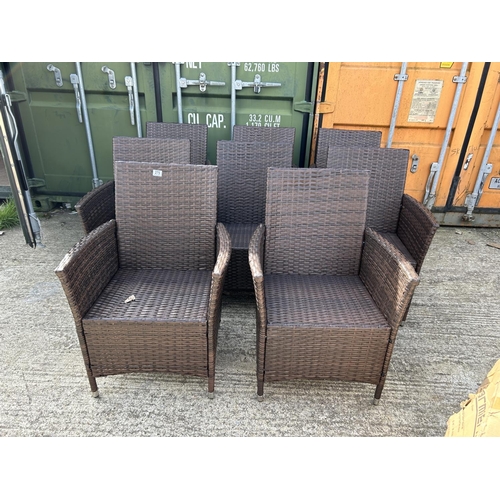 279 - A set of 8 modern rattan garden chairs with cushions (as new)