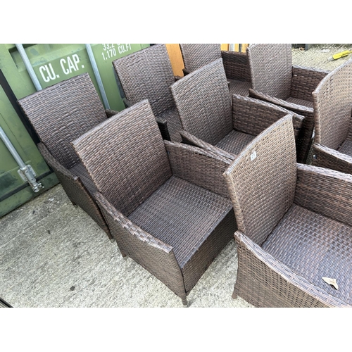 279 - A set of 8 modern rattan garden chairs with cushions (as new)