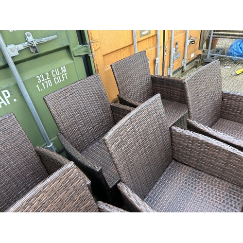 279 - A set of 8 modern rattan garden chairs with cushions (as new)