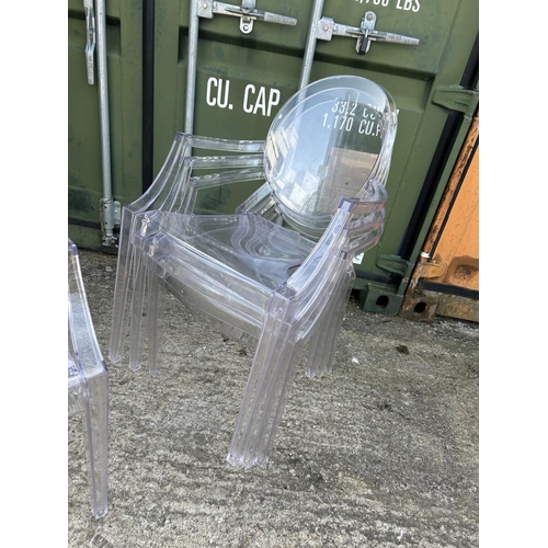 282 - A set of clear Perspex stacking chairs