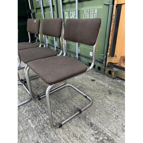 286 - A set of four mid century brown upholstered chrome cantilever chairs