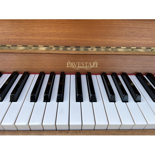 291 - An EVESTAFF MINI GRAND teak cased upright piano 130cm wide