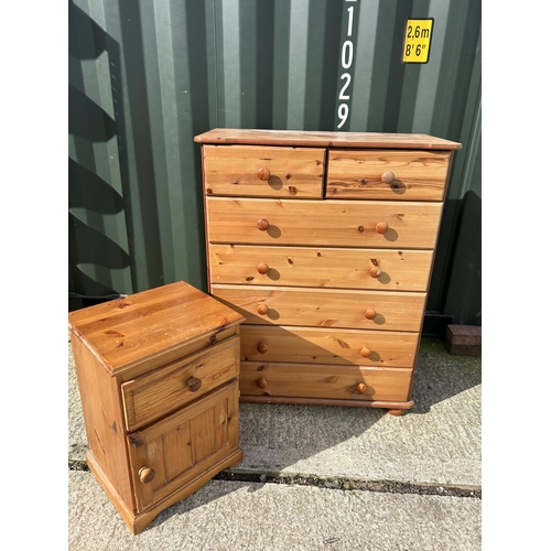 297 - A pine chest of seven together with a pine bedside