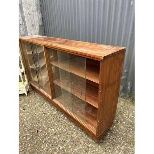 3 - A mid century teak cabinet together with a painted wall shelf