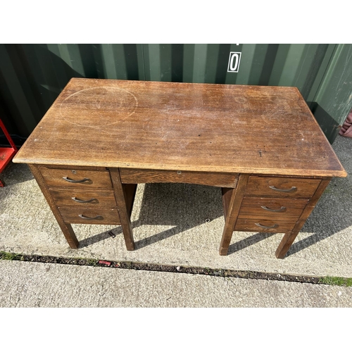 308 - A early 20th century oak typist desk  137x77x76