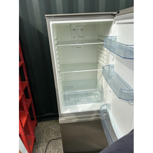 320 - A silver Zanussi fridge freezer