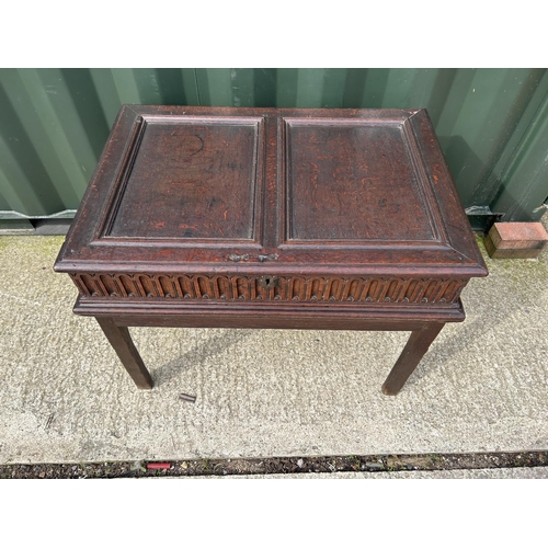 326 - A large carved oak bible box on stand 91x64x70