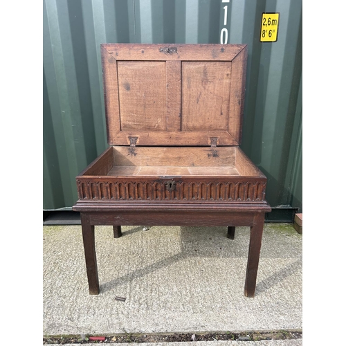 326 - A large carved oak bible box on stand 91x64x70