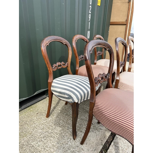 328 - A set of six Victorian mahogany balloon back dining chairs with striped upholstery