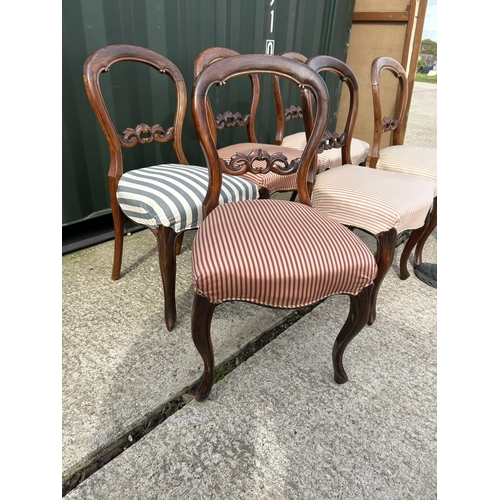 328 - A set of six Victorian mahogany balloon back dining chairs with striped upholstery