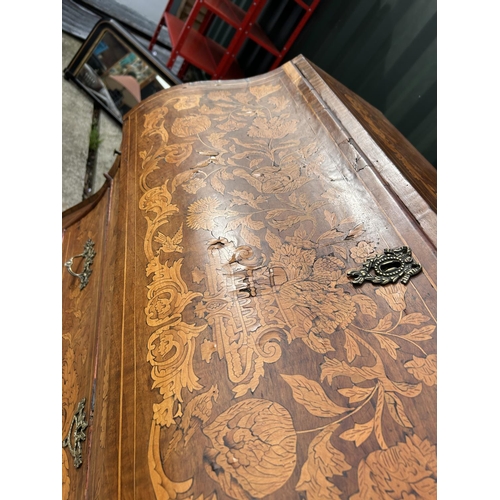 331 - An early Dutch marquetry inlaid bureau with fitted interior writing well and three long drawers rais... 