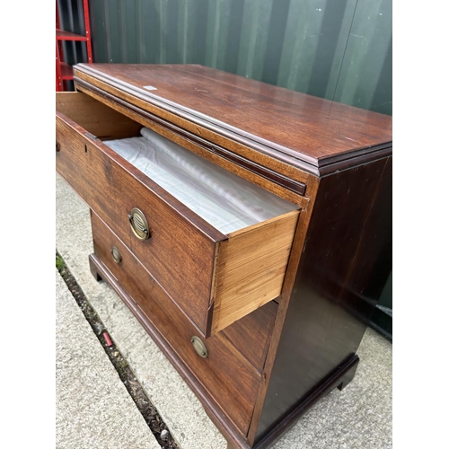 333 - A Georgian mahogany bachelors chest of three with brushing slide 108x53x97