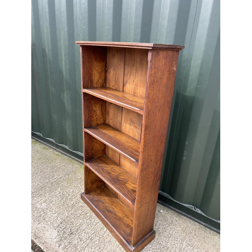 334 - A solid oak open fronted bookcase 74x26x144