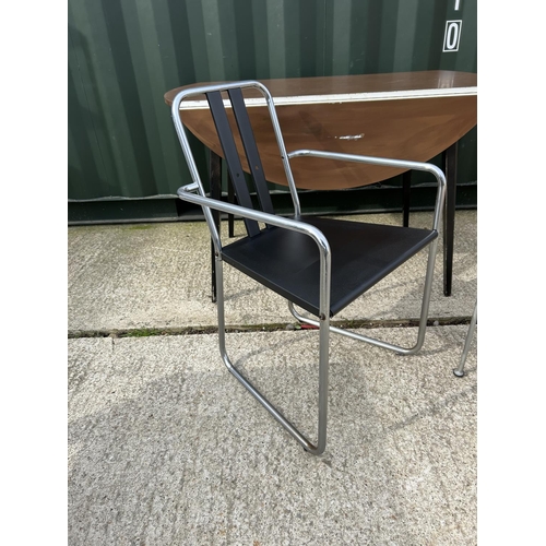 339 - Two mid century chairs together with a painted drop leaf table